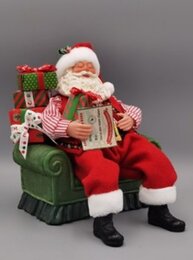 Kerstman zittend zetel 28cm